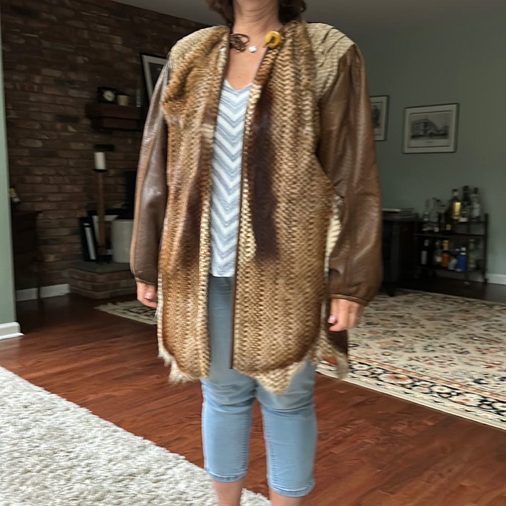 Leather and fur mid length jacket orange lining